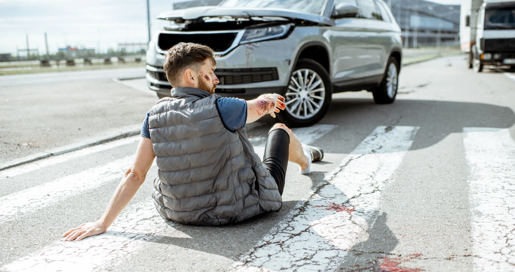 Car Strikes Pedestrian